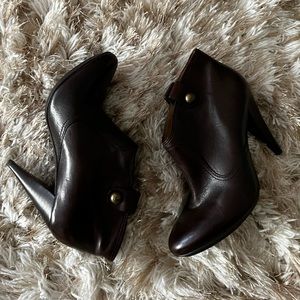 Coach dark brown ankle booties with wood heel.